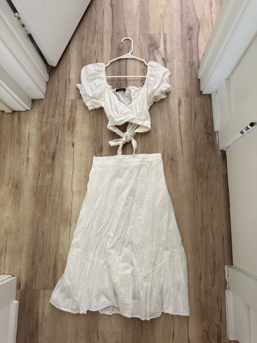 Two piece white puff-sleeve top with midi skirt